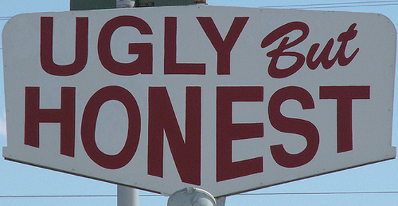 Sign reads Ugly But Honest